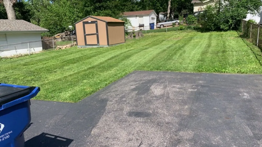 Top-rated lawn care service for outdoor upgrades across Florissant, MO - Hiz Wit A Touch Of Herz