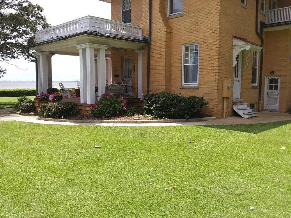 Custom outdoor landscaping in Hampton, VA by H&J Total Lawn Care