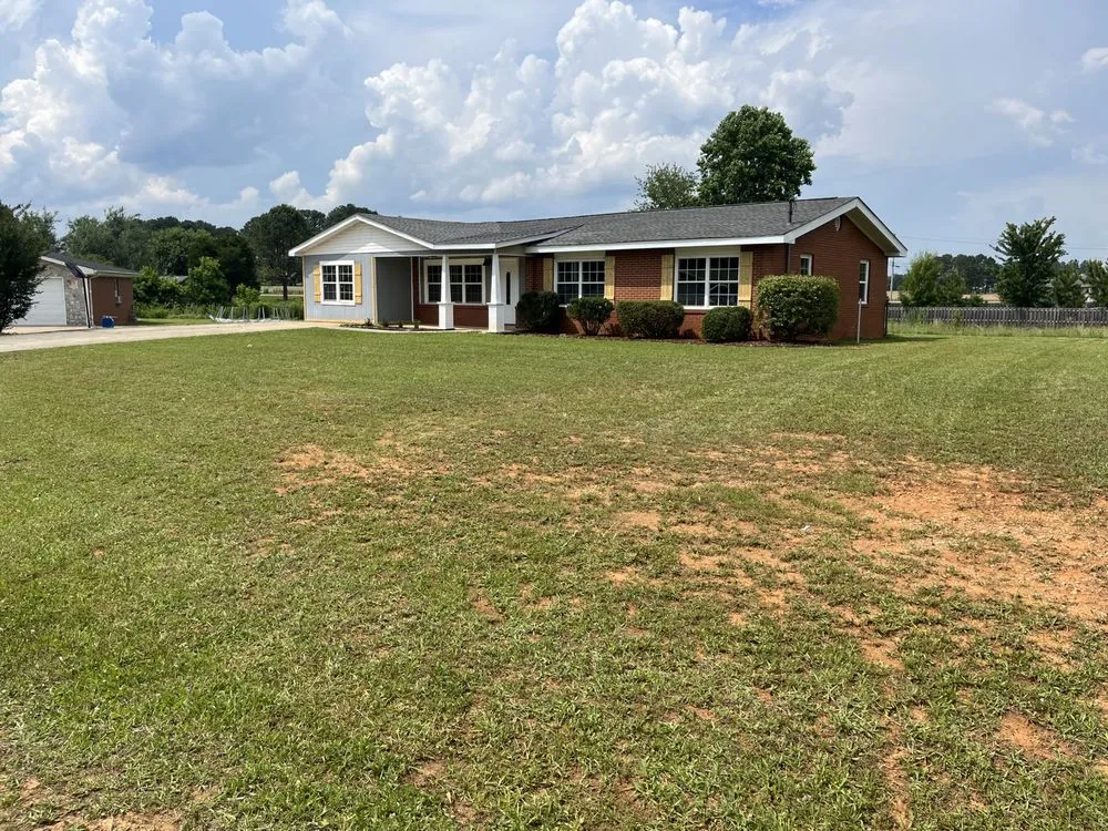 Custom yard cleanup service for residential properties across Athens, AL - H&K Lawn Care Services