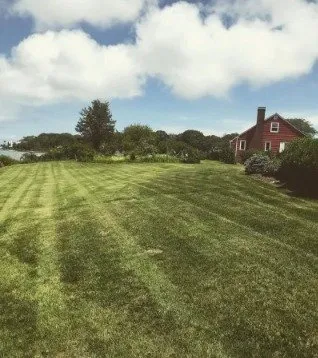 Custom landscaping services for residential properties in West Tisbury, MA by H&L Hardscape and Landscape