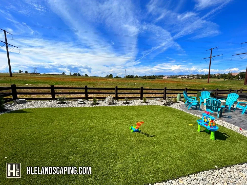 Reliable lawn mowing service for outdoor upgrades in Aurora, CO by HLE Landscaping & Concrete