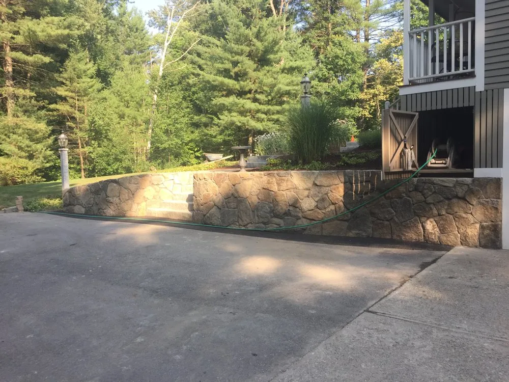 Expert lawn mowing service with custom design in Lowell, MA by HM Soares Construction & Landscaping