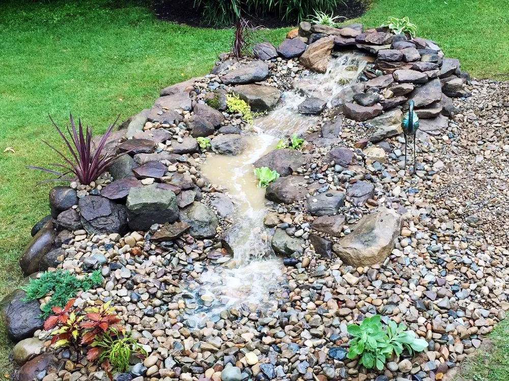 Custom landscape design in Uniontown, OH by Hoffman's Water X Scapes