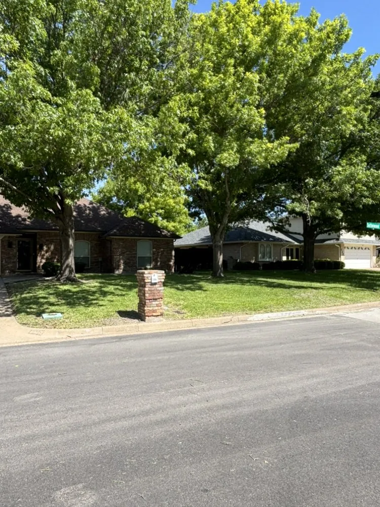 Affordable landscape design for residential properties in Fort Worth, TX by Hog Wild Lawn Care