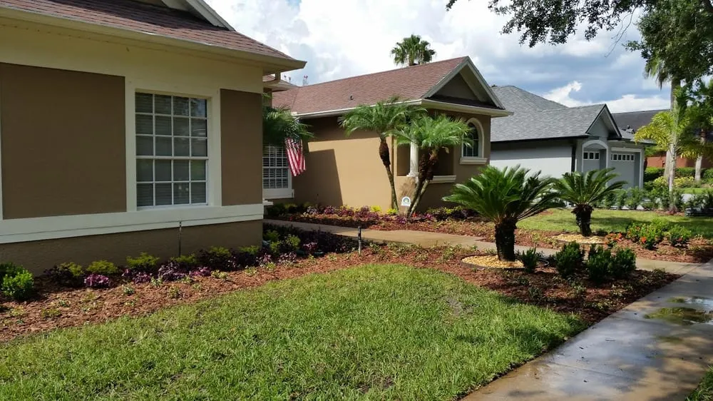 Reliable lawn mowing service for year-round maintenance in Orlando, FL by Hogan Landscapes