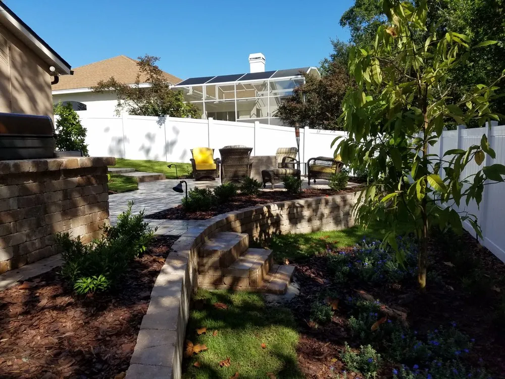 Top-rated lawn mowing service for residential properties across Orlando, FL - Hogan Landscapes