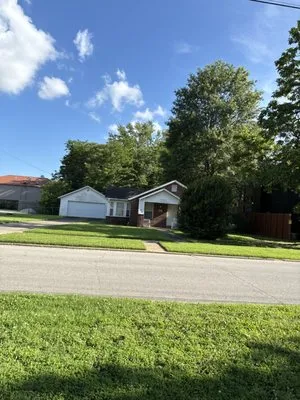 Hogs Wild Lawn and Landscaping Logo