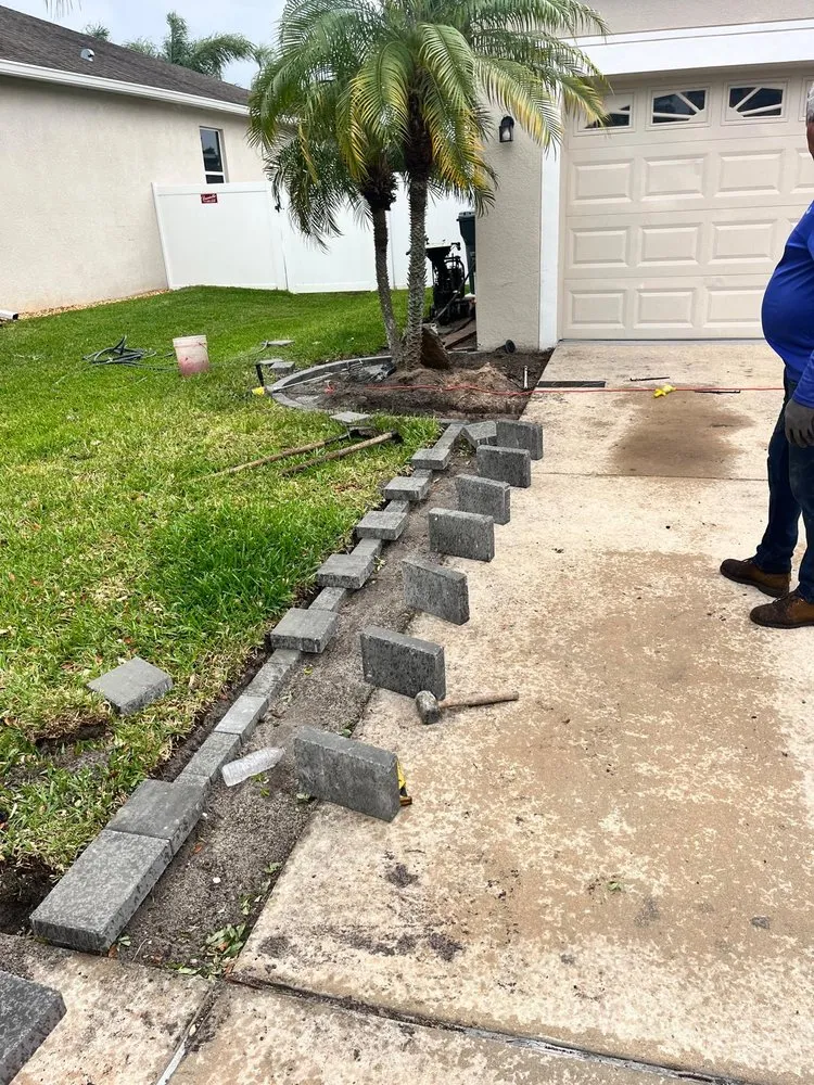 Professional lawn mowing service with custom design in Tampa, FL by HoH Sod Services