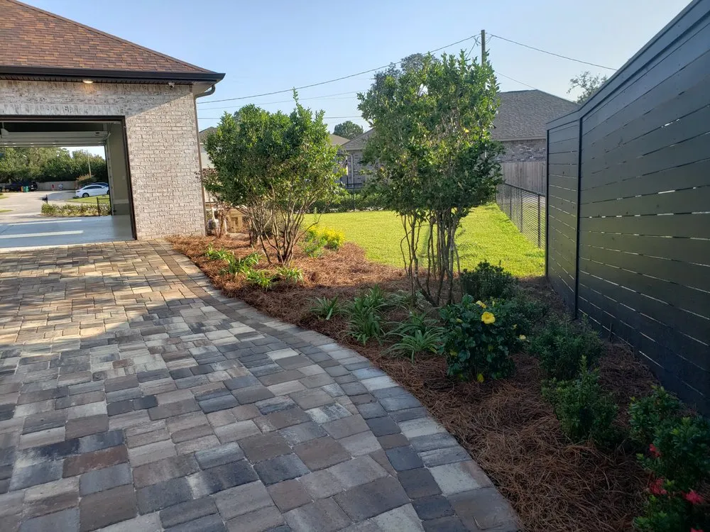 Affordable lawn mowing service for beautiful yards in Fort Walton Beach, FL by Hole Nother Level