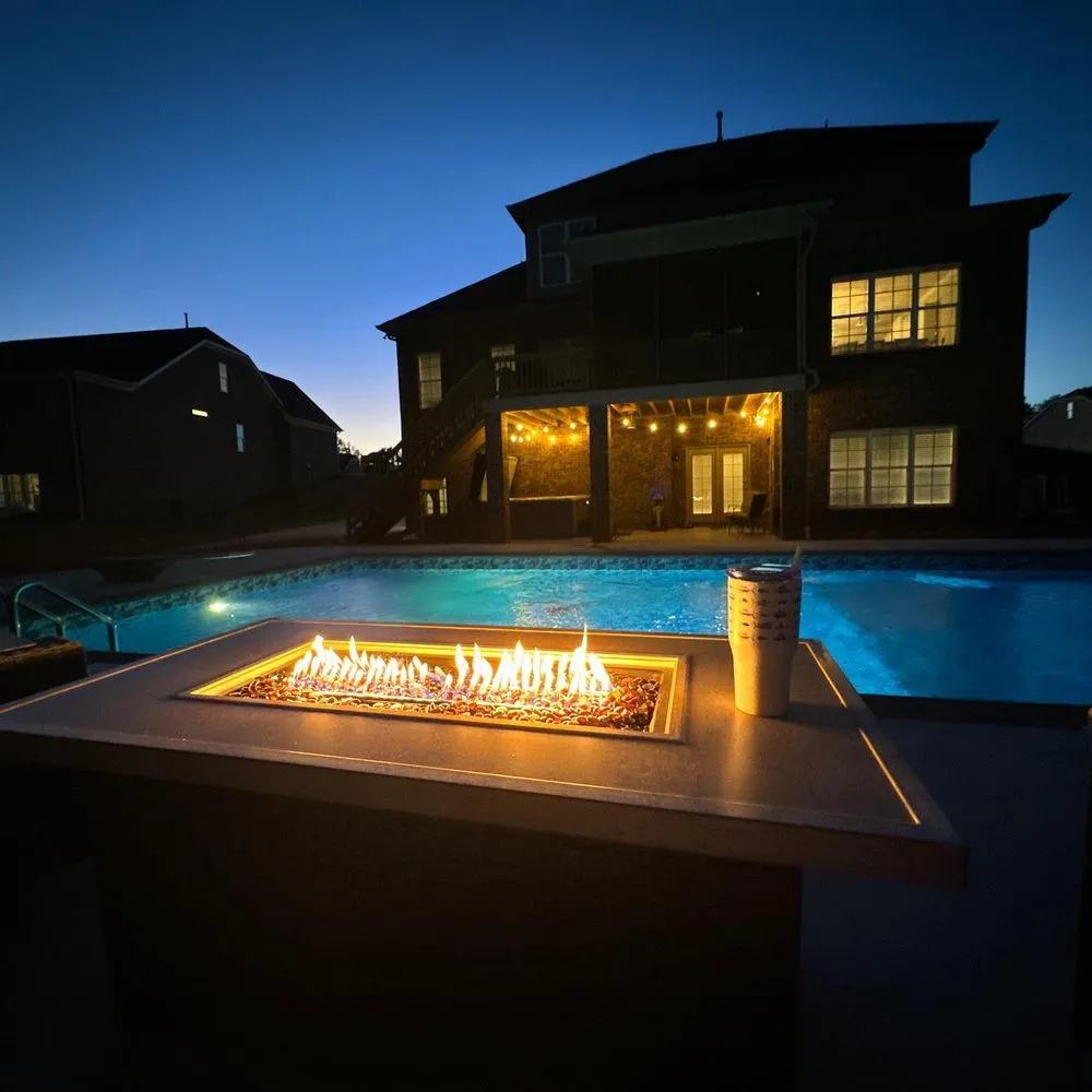 Professional lawn mowing service for year-round maintenance across Lewisville, NC - Holiday Pools