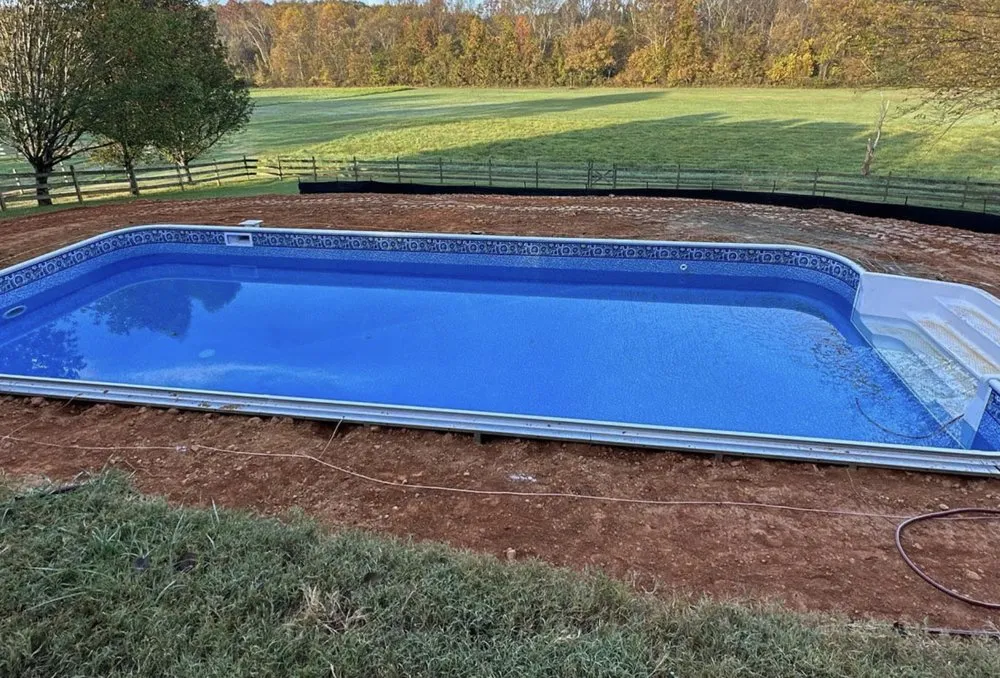 Affordable landscape design for homes in Lewisville, NC by Holiday Pools