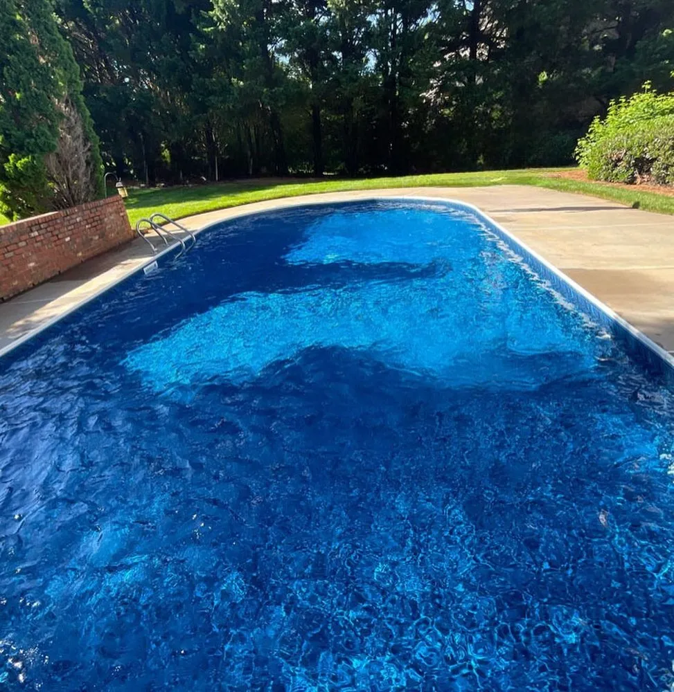 Professional landscape installation in Lewisville, NC by Holiday Pools