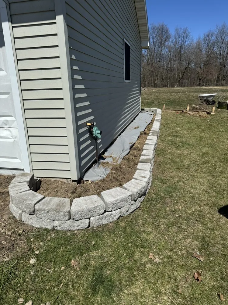 Professional lawn mowing service with custom design in Rosebush, MI by Holler Boys Lawn Care And Handyman Services