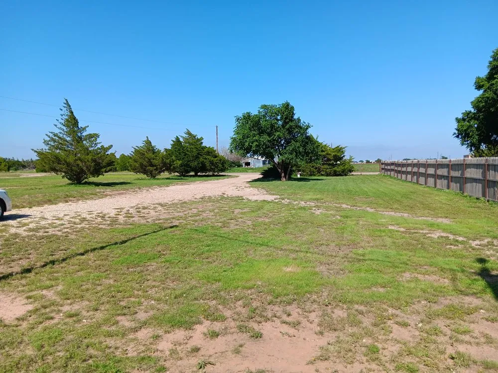 Custom outdoor landscaping for year-round maintenance in Lubbock, TX by Holloway Lawns