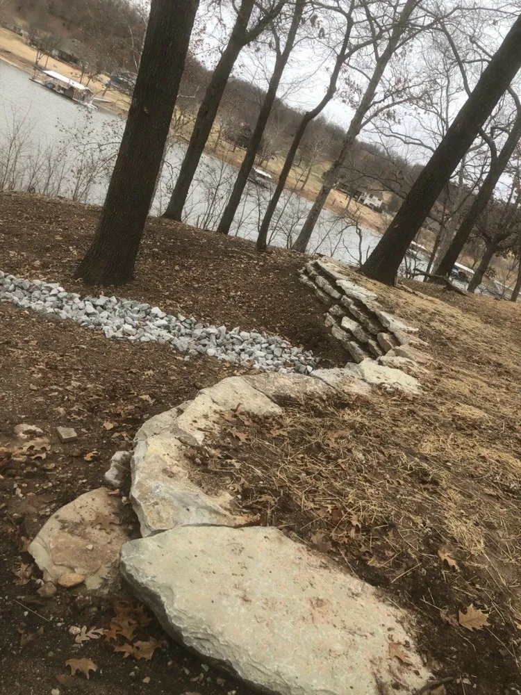 Professional landscape design with custom design in Grove, OK by Holly Tree Landscaping & Retaining Walls