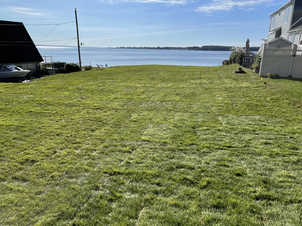Affordable lawn mowing service for outdoor upgrades in Riverside, RI by Holmes Landscape Construction