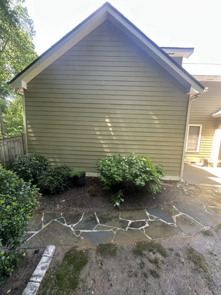 Custom landscape installation in McDonough, GA by Holt Maintenance