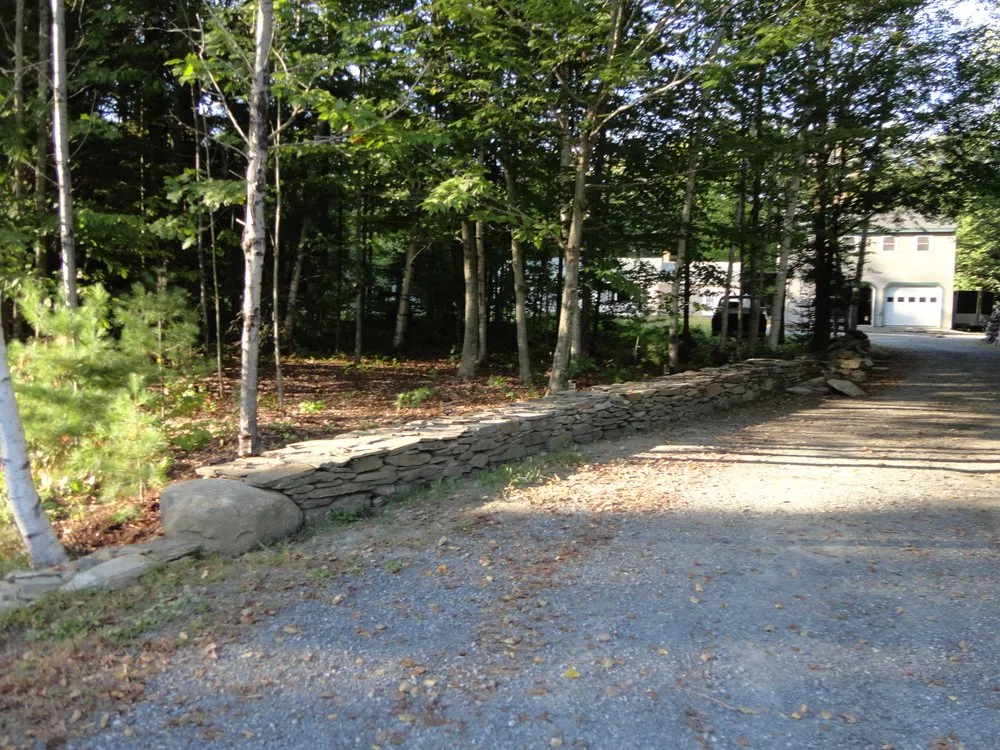 Affordable landscape installation in Sidney, ME by Holt's Yard Improvements