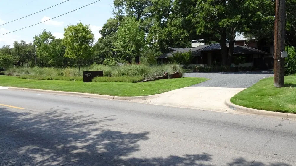 Custom landscape installation in Farmers Branch, TX by Home Lawn Care