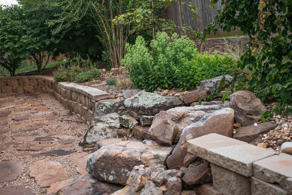 Custom garden landscaping for year-round maintenance in Edmond, OK by Homestead Landscape & Construction