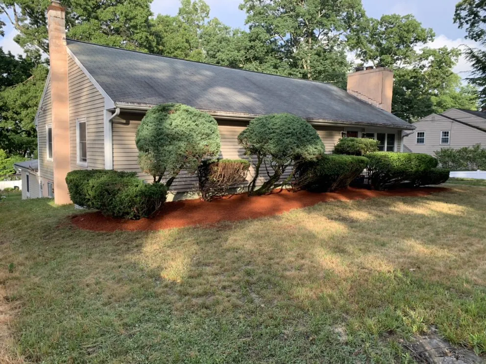 Top-rated outdoor landscaping with custom design in Milford, MA by Hometown Landscaping