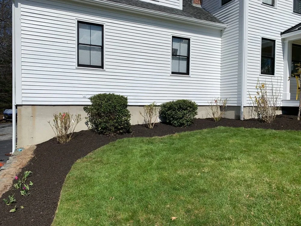 Top-rated lawn mowing service for residential properties in Milford, MA by Hometown Landscaping
