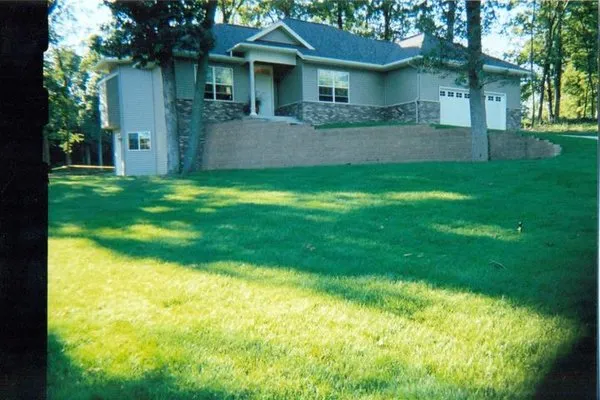 Hometown Lawn Care & Landscaping Logo