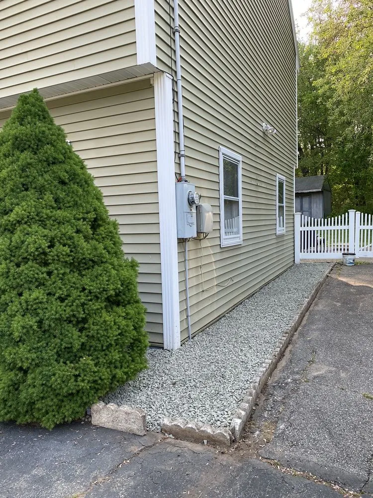 Local yard maintenance with custom design in Fitchburg, MA by Hometown Pros