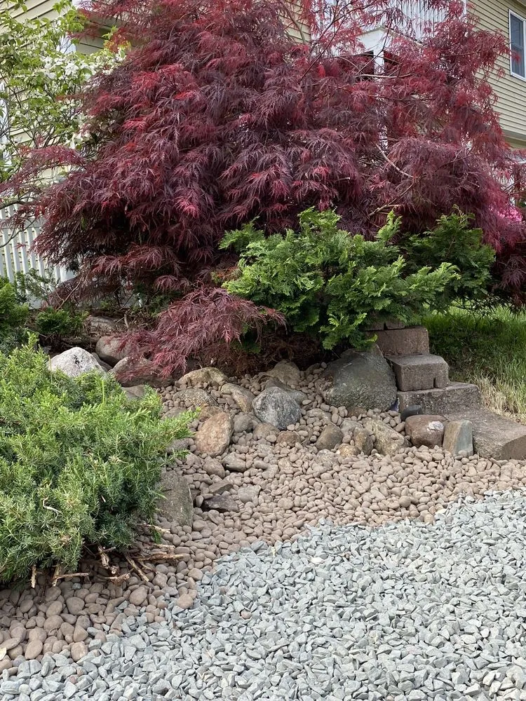 Top-rated lawn care service with custom design across Fitchburg, MA - Hometown Pros