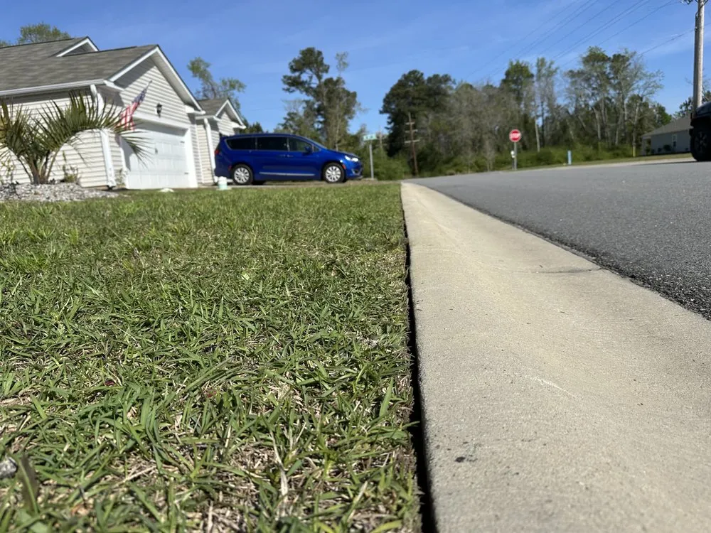 Custom lawn mowing service for homes across Conway, SC - Homewood Services