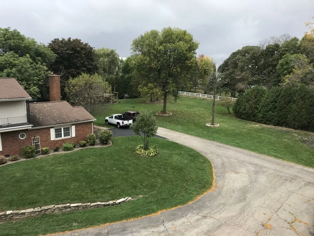 Local outdoor landscaping with custom design in Oshkosh, WI by Homeworks Real Estate