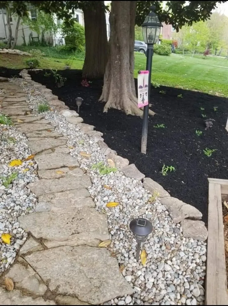 Custom landscape installation with custom design across Louisville, KY - Honest Landscaping