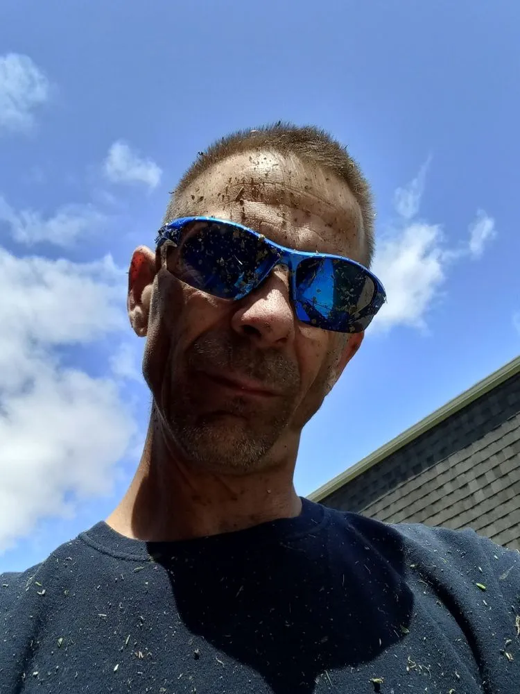 Local yard cleanup service for year-round maintenance in Kansas City, MO by Honest Timmys Lawn Care & Handyman Services