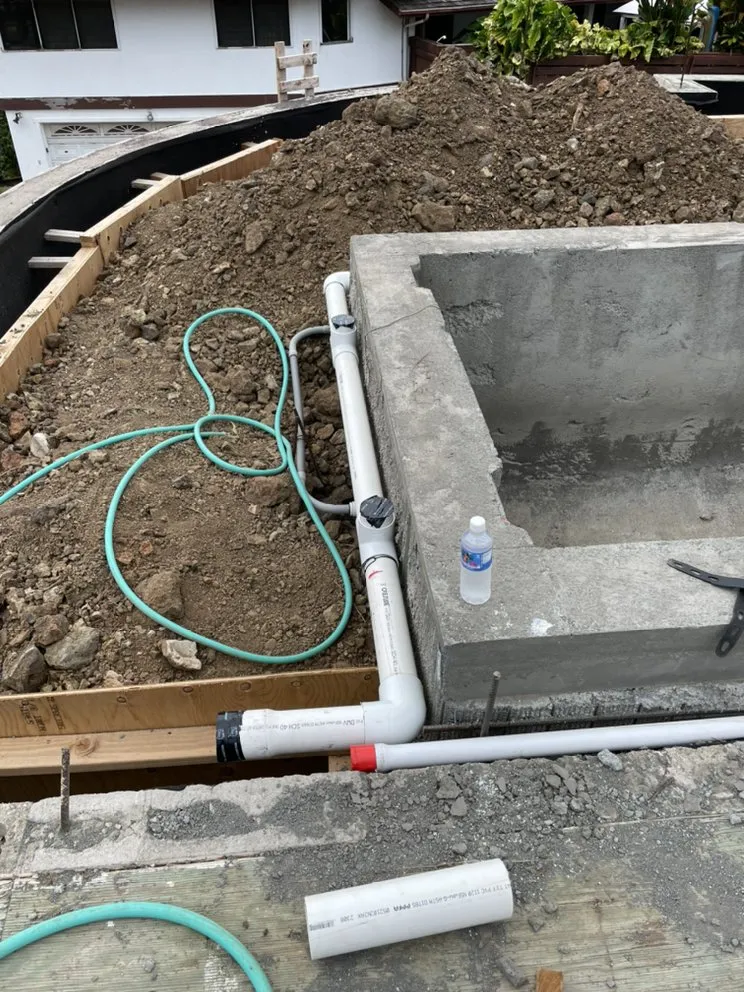 Local landscape installation with custom design in Kaneohe, HI by Honua Wai Irrigation & Landscapes