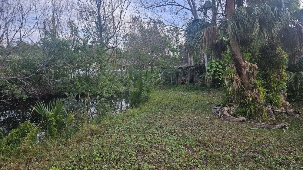 Top-rated lawn mowing service in Palm Bay, FL by Hooah Land Services