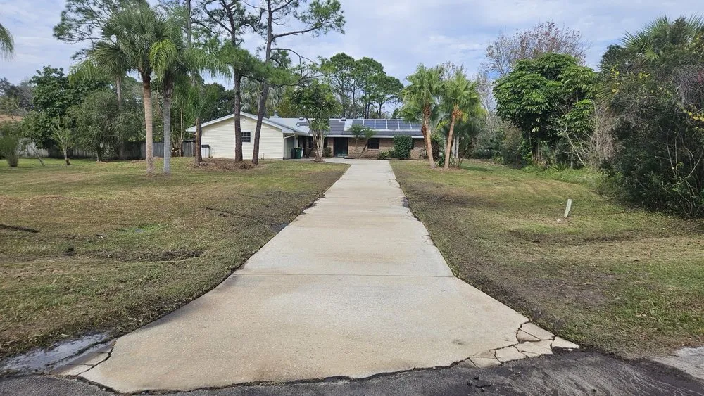 Expert yard cleanup service for year-round maintenance in Palm Bay, FL by Hooah Land Services