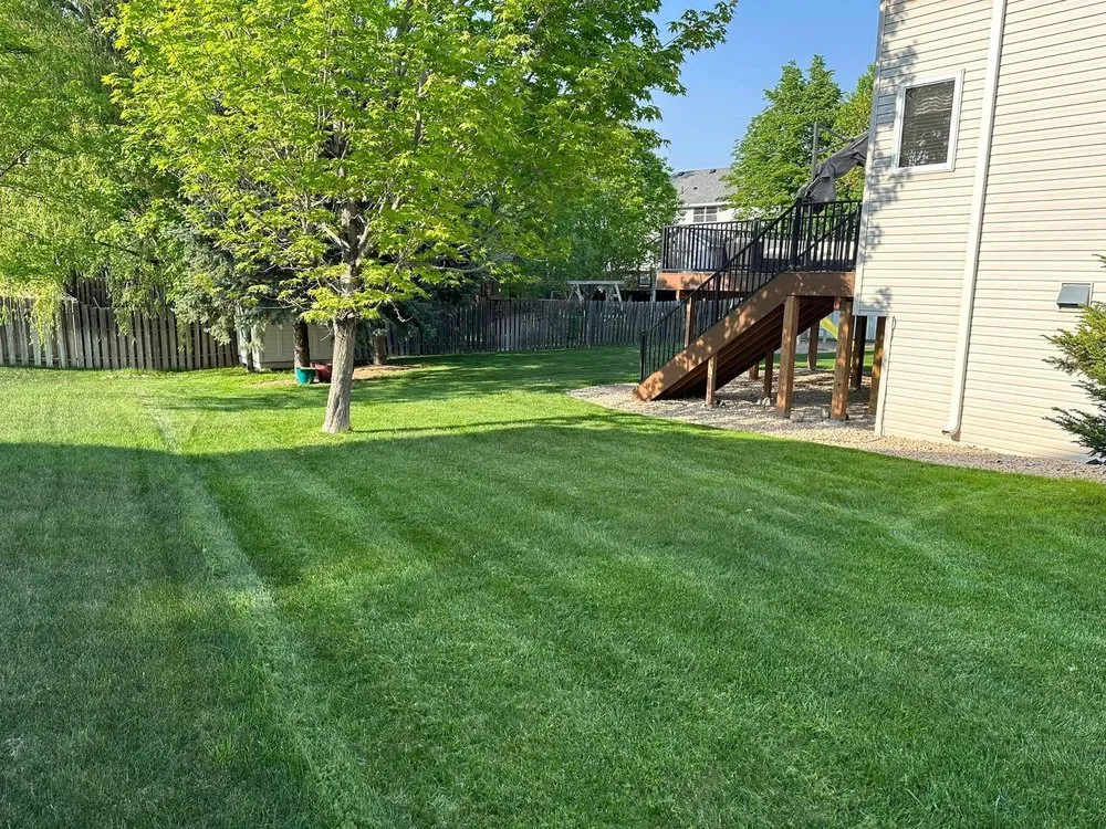 Reliable yard maintenance for residential properties across Champlin, MN - Hook & Ladder Lawn Services