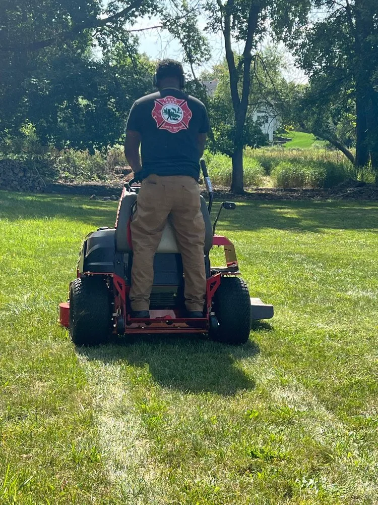 Reliable lawn care service for year-round maintenance across Champlin, MN - Hook & Ladder Lawn Services