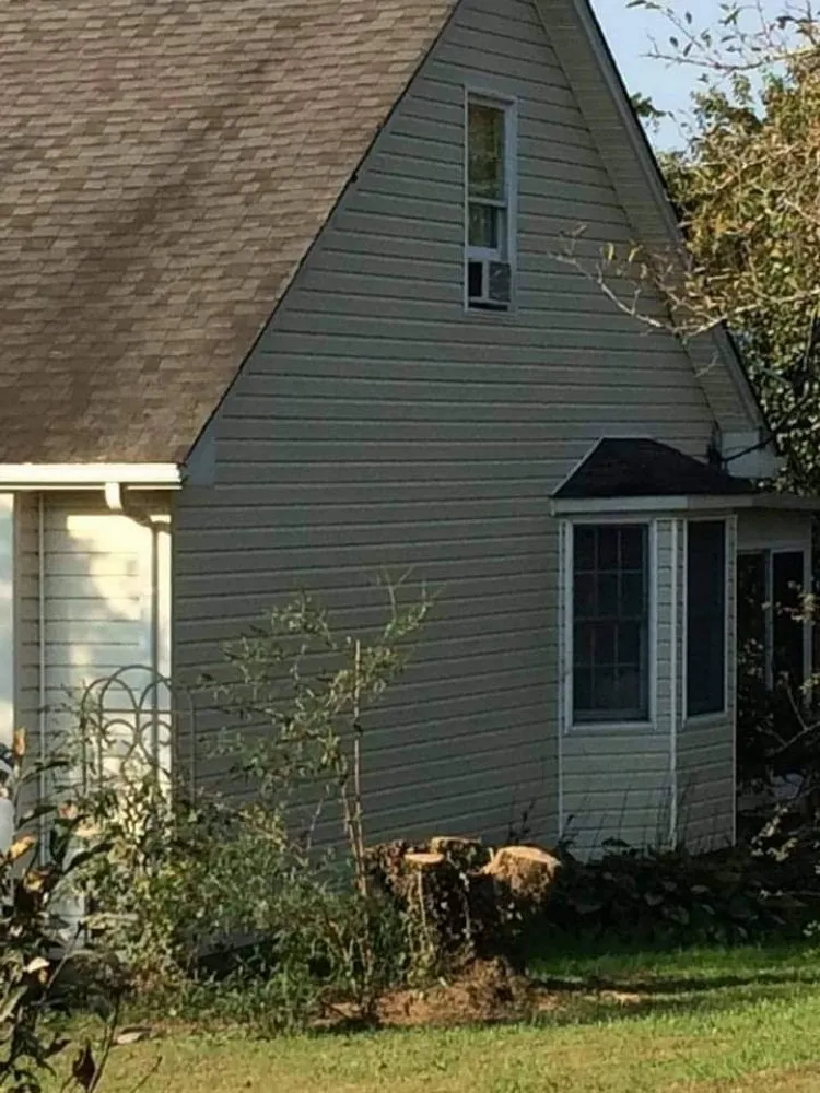 Custom yard cleanup service for outdoor upgrades in Georgetown, SC by Hook & Ladder Renovation's