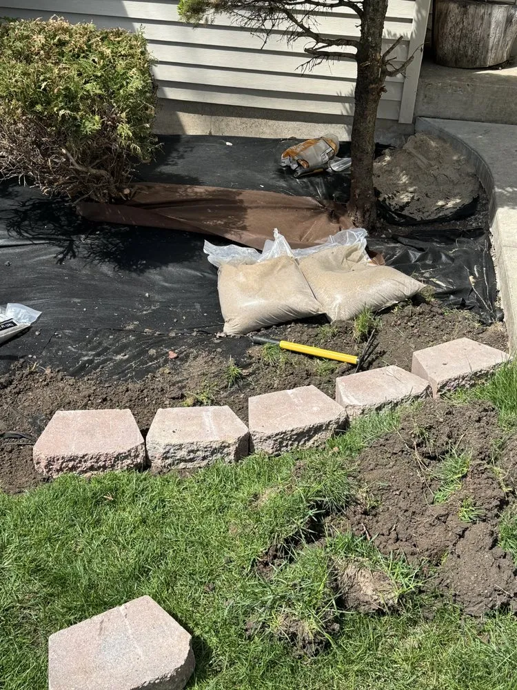 Affordable lawn care service for year-round maintenance in Milwaukee, WI by Hopkins Handiwork