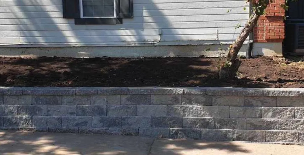 Custom yard maintenance for year-round maintenance across Grandview, MO - Hopkins Hardscapes