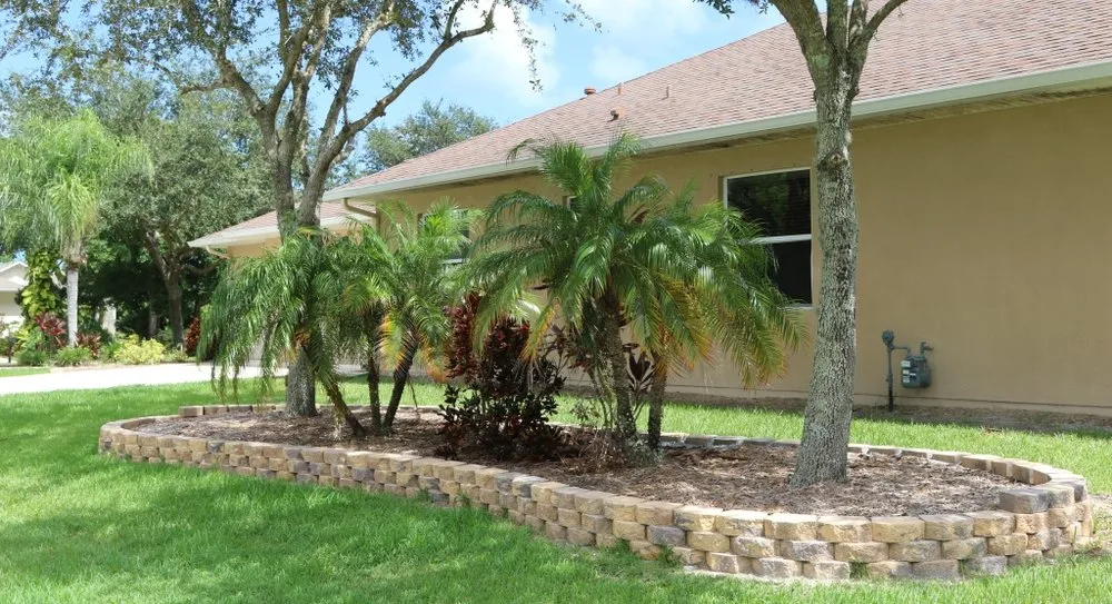 Expert lawn care service for residential properties in Melbourne, FL by Hortus Landscaping