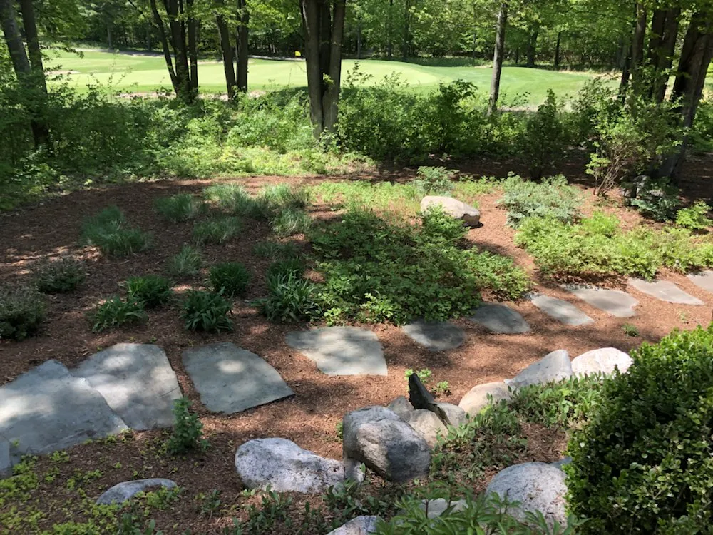 Custom residential landscaping with custom design in Frankfort, MI by Hospenthal Outdoor Service