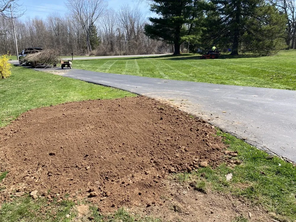 Custom landscape installation in Holley, NY by Hound lawn service & landscaping