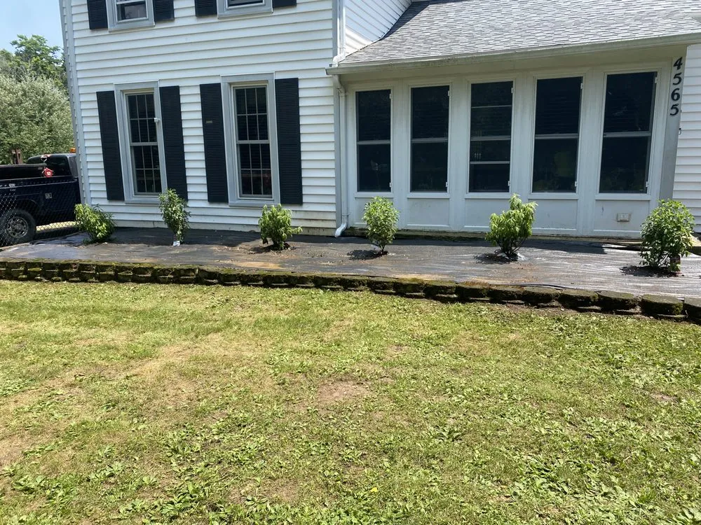 Custom landscape installation for homes in Holley, NY by Hound lawn service & landscaping