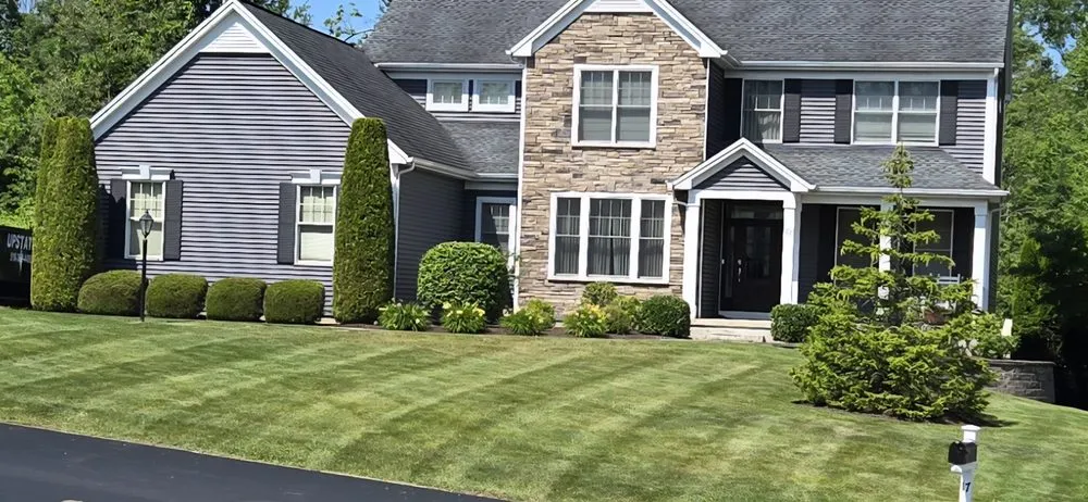 Top-rated lawn care service for year-round maintenance across Howes Cave, NY - House Of Becker