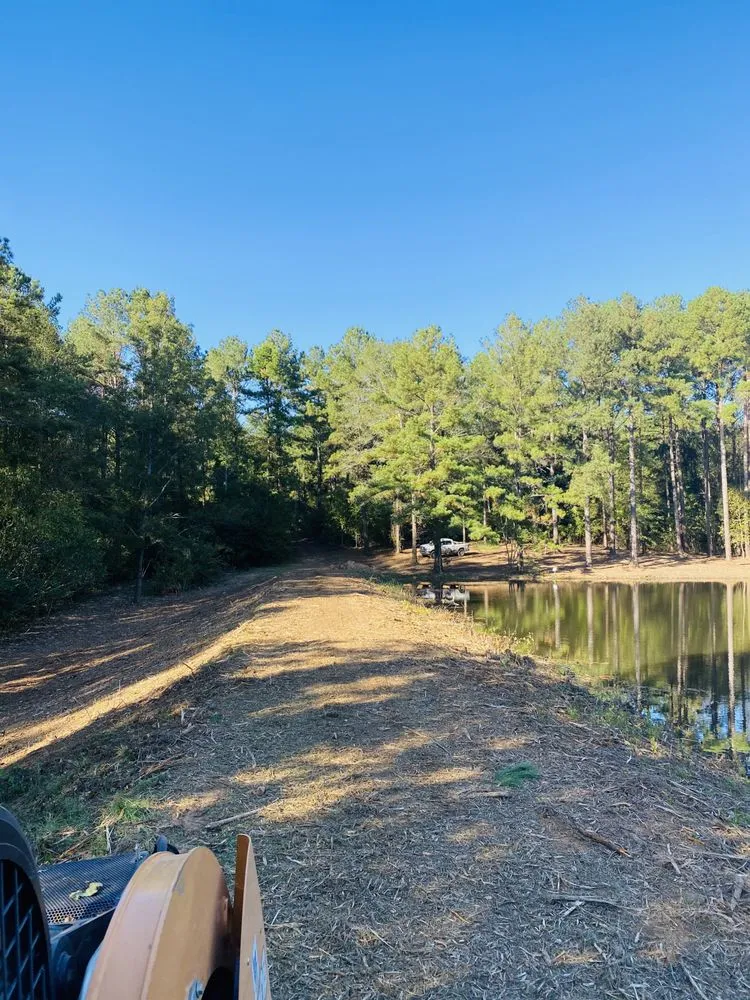 Professional lawn mowing service in Carthage, MS - Houston’s Mulching & Excavation Service