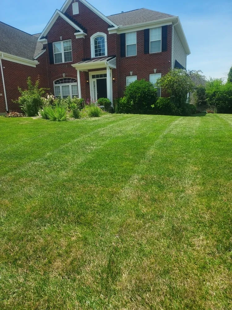 Professional lawn care service for residential properties in Dayton, OH by Howard's Lawn Care And Snow Removal