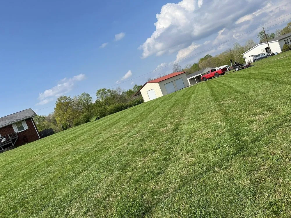 Reliable yard maintenance for residential properties across Charlotte, TN - Howell And Sons Lawn Care