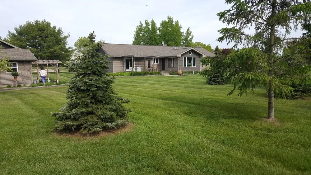Top-rated yard maintenance for year-round maintenance in Oscoda, MI by Howes Lawn Service